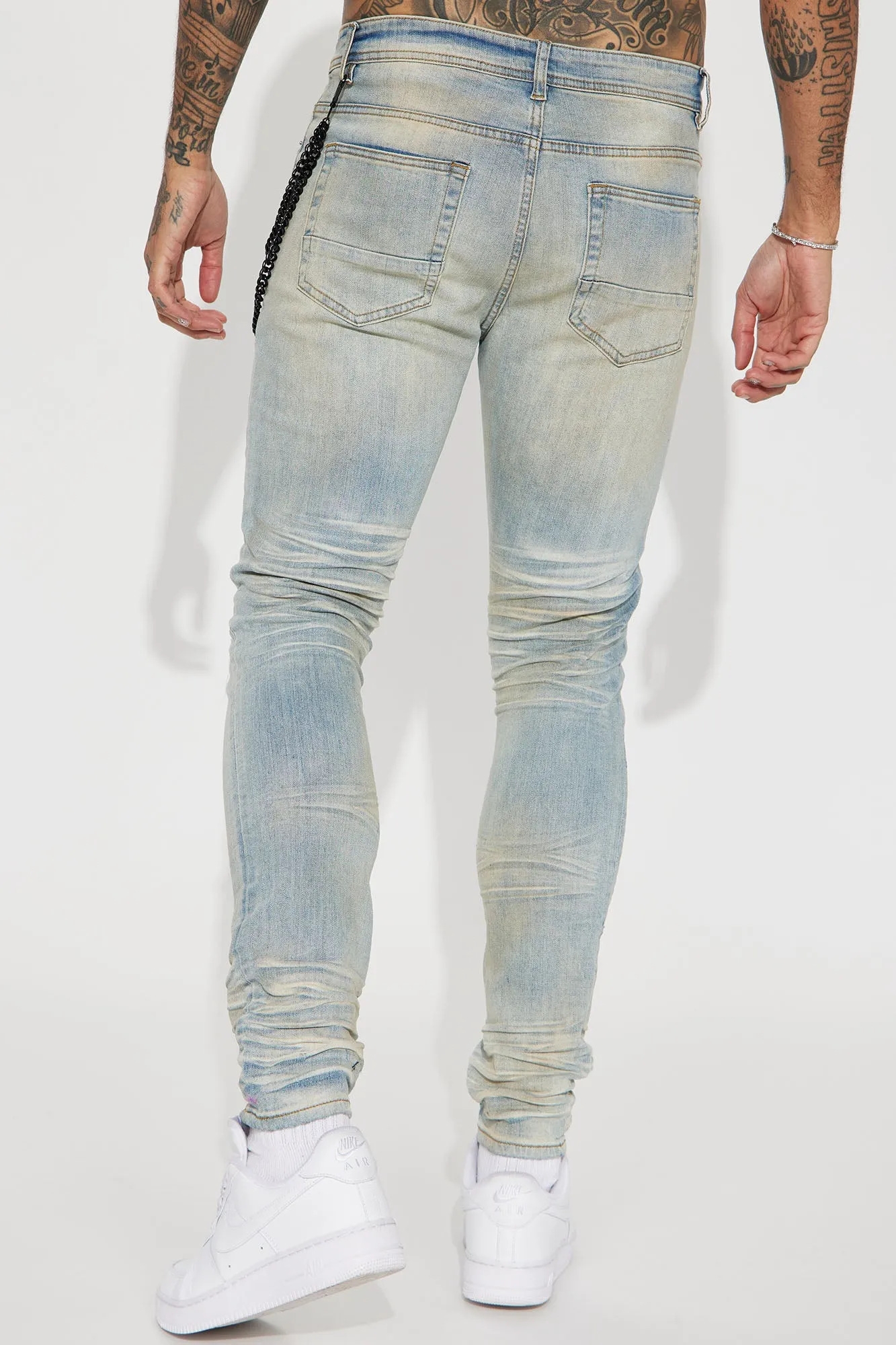 About My Chain Ripped Stacked Skinny Jeans - Vintage Blue Wash