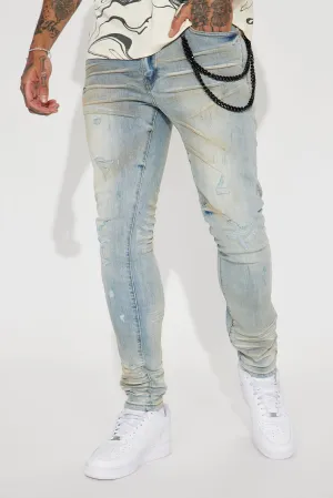 About My Chain Ripped Stacked Skinny Jeans - Vintage Blue Wash